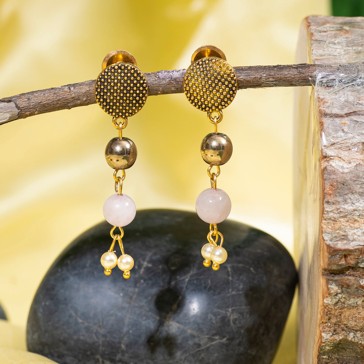 Eykaa Layered Hematite, Rose Quartz, Freshwater Pearl, And Shell Pearl Earrings Hanging On The Tree Branch.