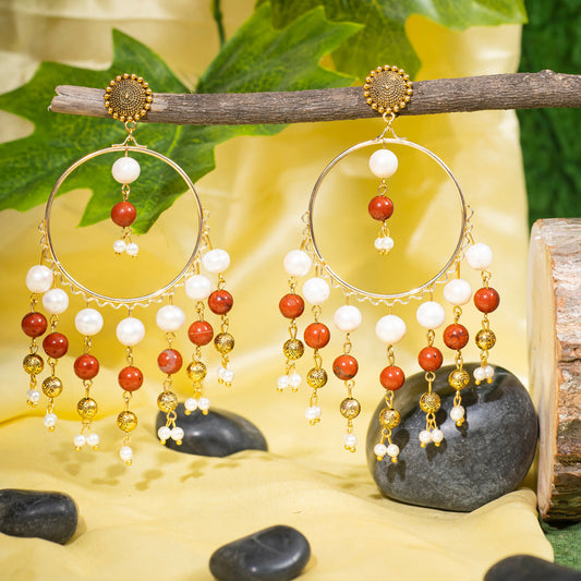 Eykaa Red Jasper With Fresh Water Pearl And Shell Pearl Earrings Hanging On The Tree Branch.