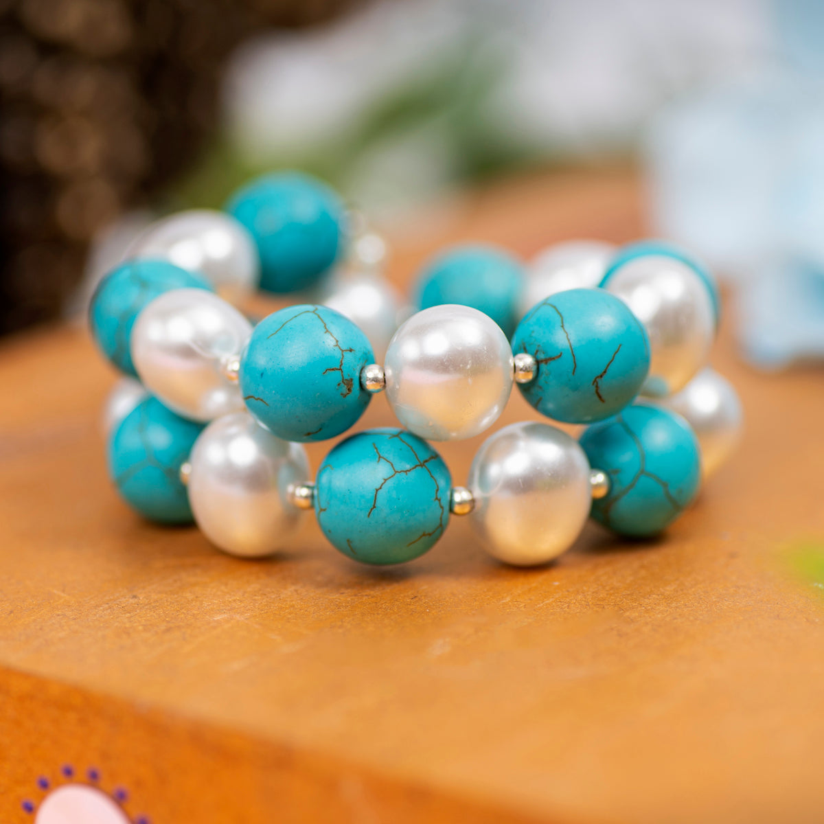 Eykaa Firoza With Korean Pearl Balls Bracelet On A Rustic Wooden Slice.

Eykaa
stone jewellery
womens jewellery
earing for women
bracelet for women
necklace for women
jewellery stores