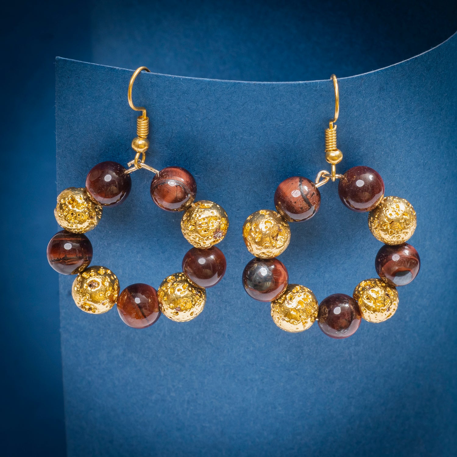 RED TIGER EYE, GOLDEN LAVA AND TIGER EYE, AND GOLDEN PENDANT NECKLESS WITH EARRINGS.