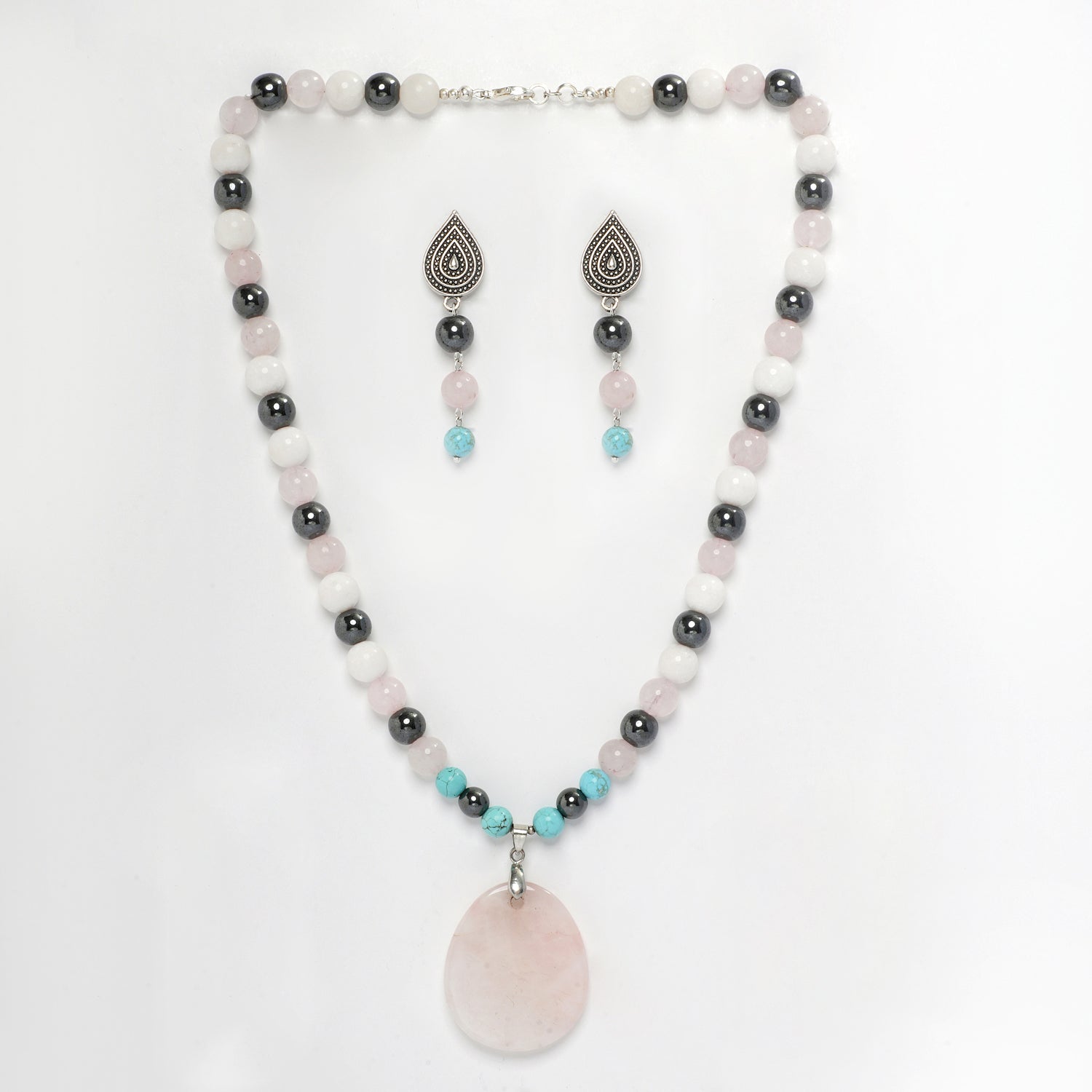 Eykaa Rose Quartz, Hematite, Marble, Firoza Necklace And Earrings With Rose Quartz Pendant On A White Background.