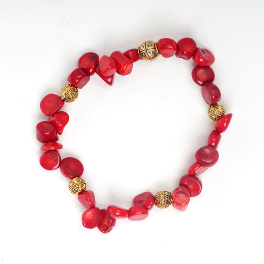 Eykaa White and Red Coral with Golden Beads Bracelet On A White Background.