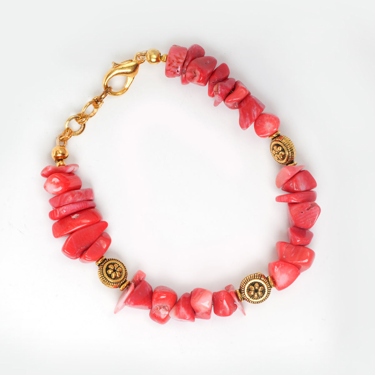 Eykaa Pure Coral Bracelet On A White Background.