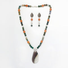 Eykaa Orange Aventurine, Indian Agate Necklace With Agate Pendant And Earrings On A White Background.

Eykaa
stone jewellery
womens jewellery
earing for women
bracelet for women
necklace for women
jewellery stores