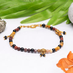 EYKAA MOAKITE, BLACK ONYX AND GOLDEN SPACER BEADS ANKLET