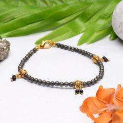 EYKAA PYRITE  WITH BLACK ONYX AND  GOLDEN SPACER BEADS ANKLET