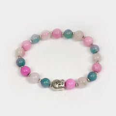 Eykaa pink and multicolored jade layered semi precious stone bracelet with silver charms on white background.