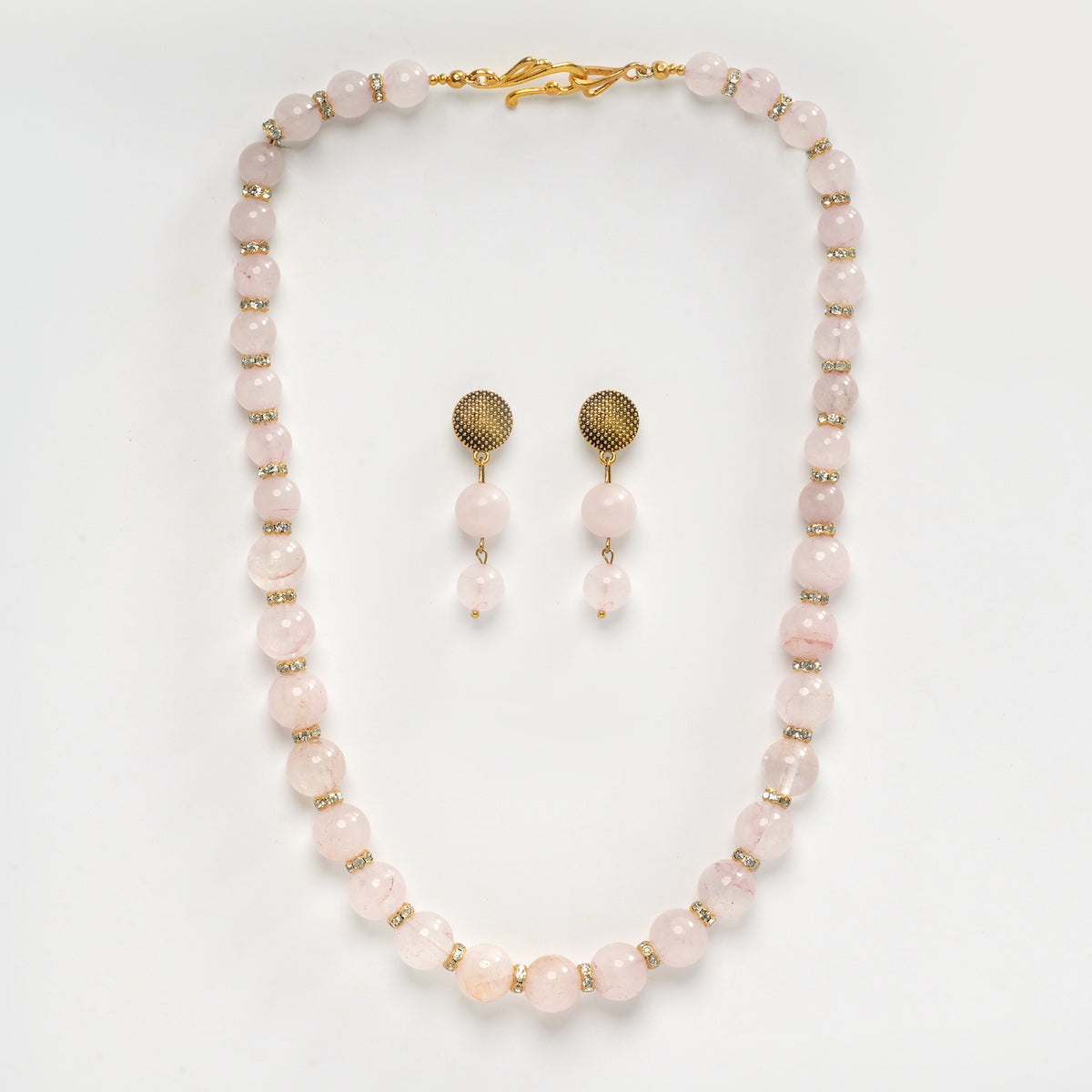 Eykaa Rose Quartz With Golden Diamond Charms Necklace With Earrings On A White Background.