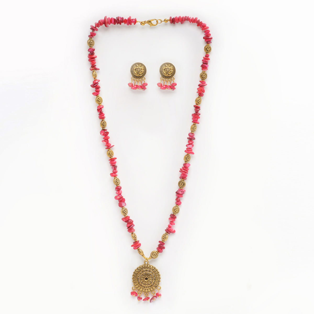 Eykaa brand necklace and earrings features red mother of pearl semi precious stone with white background.