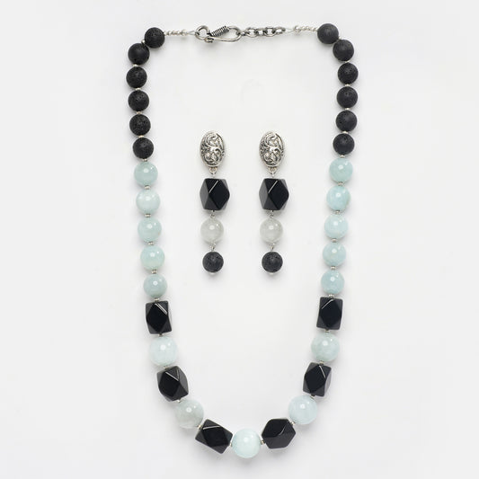 Eykaa  Aquamarine With Lava And Black Onyx Statement Necklace With Earrings On A White Background.