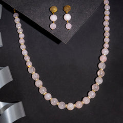 Eykaa Rose Quartz With Golden Diamond Charms Necklace With Earrings On Black Background With Silver Lace.